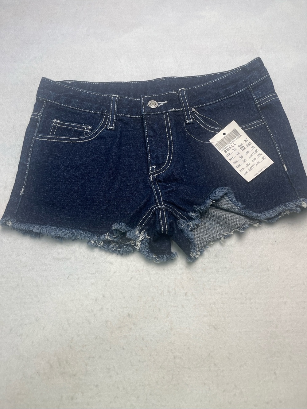 Brandy Melville Indigo Frayed Hem Denim Shorts